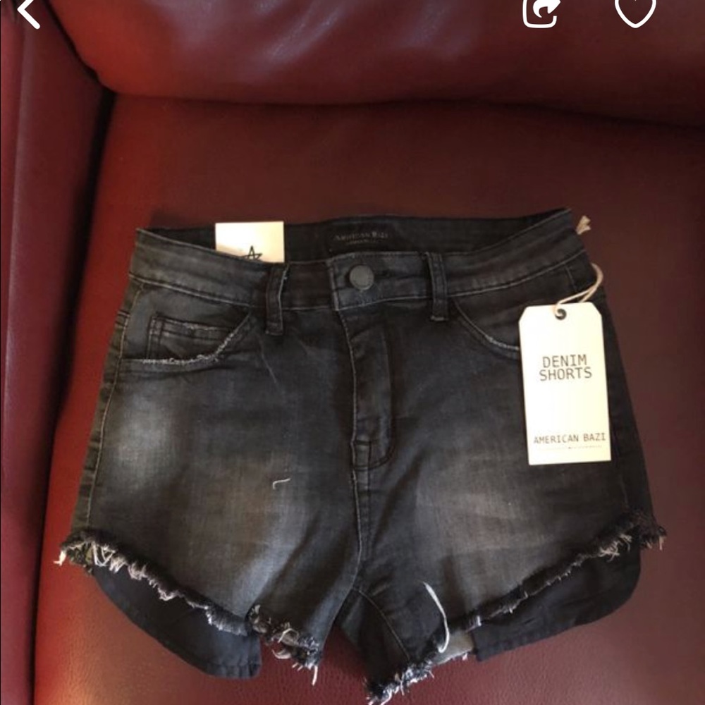 Black ripped shorts